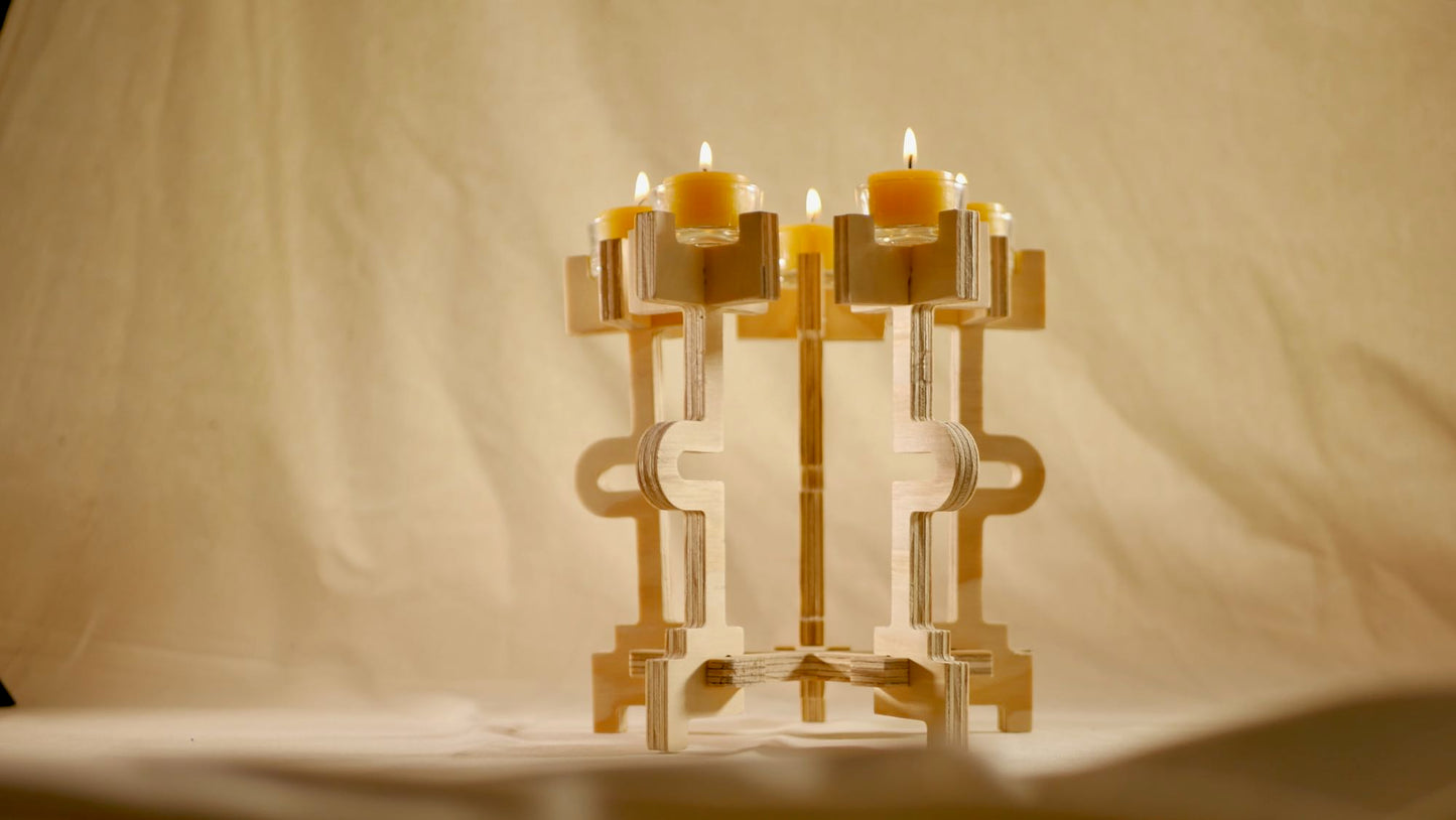 Decorative candle holder with fivecandles on a beige background